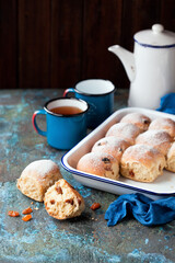 Homemade sweet buns with raisins, selective focus