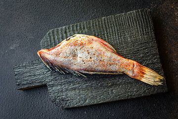 raw fish whole, headless ready to cook seafood river or sea product tasty serving size portion top...
