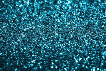 Tiffany color glitter texture  sparkling shiny  background for Christmas holiday wallpaper decoration, greeting and wedding invitation card design element, Xmas abstract background with copy space.