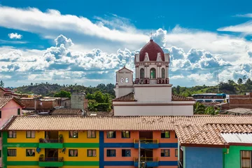 Foto op Canvas colorful houses with church in guatape colombia © Arboh