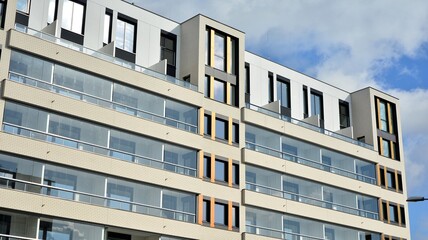 Modern and new apartment building. Multistoried modern, new and stylish living block of flats.