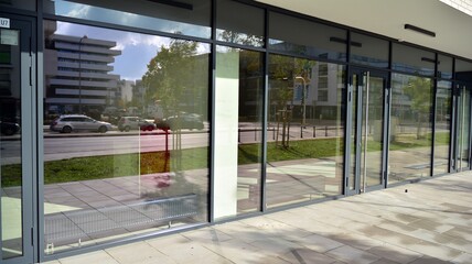 Panoramic windows of new commercial premises. Commercial property in development standard for rent.