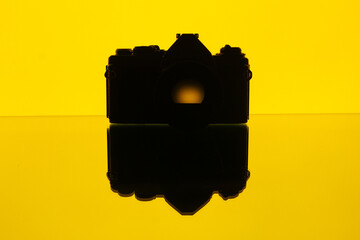 yellow vintage camera reflection
