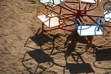 Merry go round, children's playground, sand  