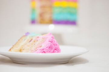 Round cake decorated with rainbow