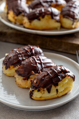 Traditional french eclairs with chocolate.
