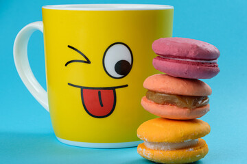 Yellow mug closeup watching macoons stacking_focus is on the eye.