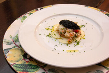 Pupunha carpaccio and lobster and caviar vinaigrette