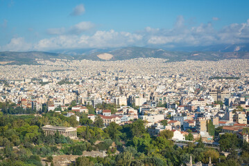 Fototapeta na wymiar View of Athens and the Temple of Hephaestus in the distance on a sunny day