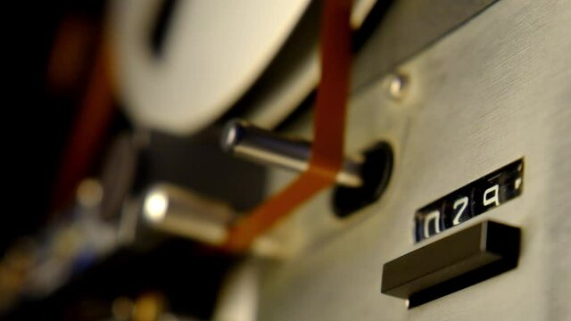 Super close up of a mechanical tape counter of a vintage reel to reel tape recorder tape speed is 7,5 inch p.s.