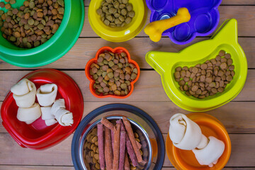 different shapes and colors pet feeders with different types of food