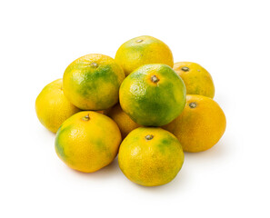 Early Japanese mandarin oranges on a white background