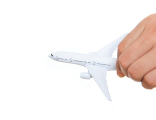 Hand holding airplane model close-up