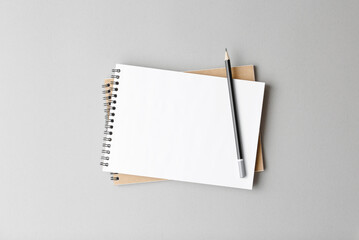 open notebook with pencil