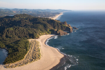 A view of the Oregon Coastal mountains and ocean toward the horizon as seen from the top of the Cascade Head Preserve