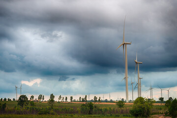 Naklejka premium Wind turbine producing alternative energy