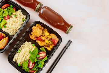 Healthy food delivery or take away lunch in plastic container.
