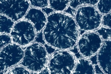 Indigo Blue Shibori Tie dye fabric texture pattern. White and Blue colors.