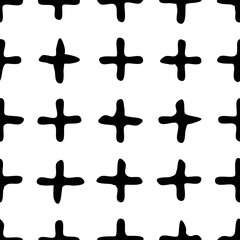 Seamless pattern. Crosses arranged in a grid, hand drawn. 