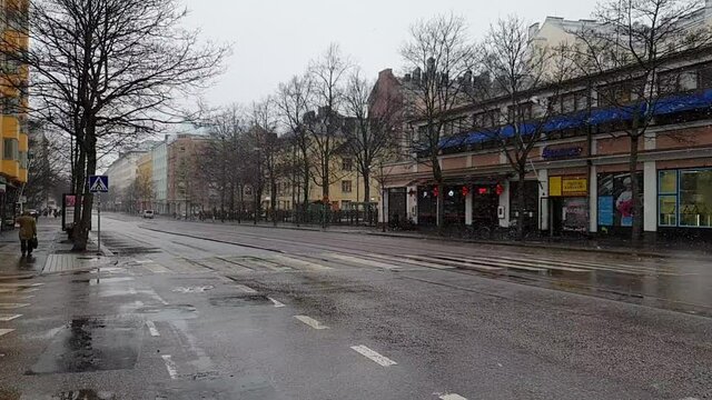 Street view with snow in slow motion
