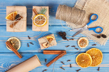 Accessories, decoration and wrapped gifts for Christmas or other celebration on boards