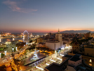 Naklejka premium Malaga city view at night at christmas time