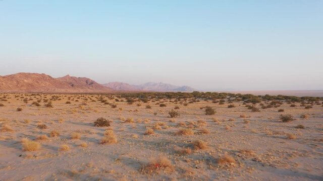Wide view from a drone of the desert of salt lagoon at mexicali baja california, route of the migrant crossing through the desert towards calexico