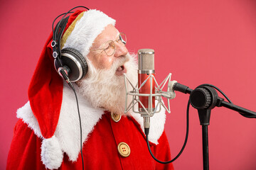 Santa Claus singing or speaking in a studio microphone. Merry Christmas. Broadcaster. Announcer....