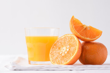 Fresh orange fruit on white background	
