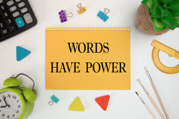 Words have power, is written on a notepad, on an office desk