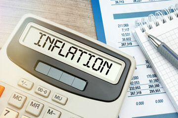 INFLATION word on calculator. Business concept