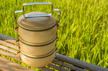 Zinc coated food carrier in Thailand countryside, beautiful natural farm atmosphere in the morning