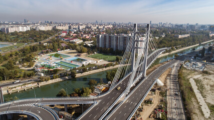 Fototapeta na wymiar Aerial view of the Ciurel Passage Suspended Bridge on a sunny day.