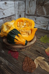 Colorful pumpkins. Decorative pumpkin and  autumn leaves - decoration 