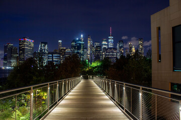 Brooklyn Bridge Park's Squibb Bridge overlooking lower manhattan (NYC)