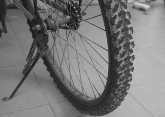 black and white close up selective focus old bicycle tire for people exercise