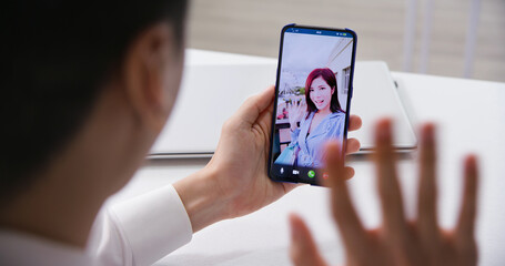 businessman video chat with friend