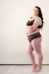 Full body of fat adult woman in lingerie