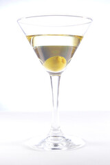 Glass with martini and olive