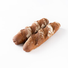  two rye baguettes on a white background