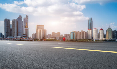 Fototapeta na wymiar Road ground and modern architectural landscape skyline of Chinese city