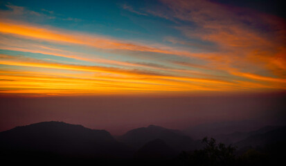 The tourist take photos at Mountain valley during sunrise. Natural summer landscape,Skyline and sunrise in Doi Ang Khang, Chiang Mai, Thailand