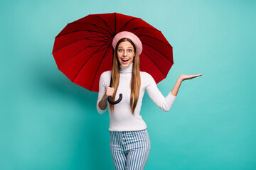 Photo of pretty excited lady hold big red umbrella hold open arm novelty advert product low price...