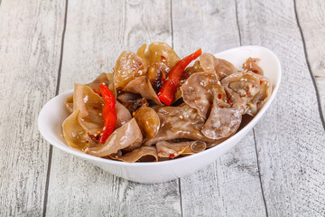 Marinated pork ears with pepper