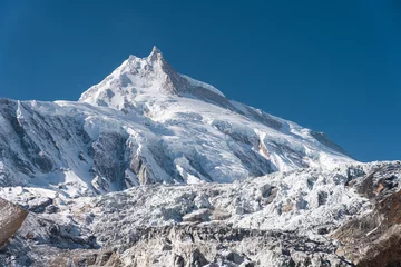 Fototapete Manaslu Manaslu mountain peak, eighth highest mountain peak in the world view from Samagaun village, Himalayas mountain range in Nepal