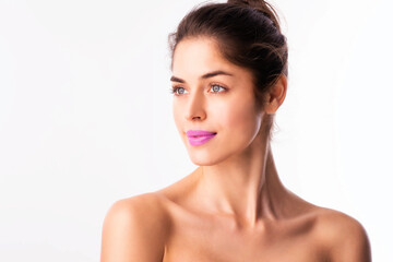 Beauty shot of young woman with flawless skin wearing purple lipstick