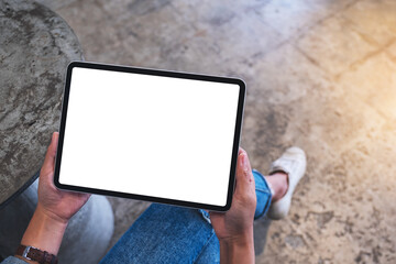 Top view mockup image of a woman holding digital tablet with blank white desktop screen