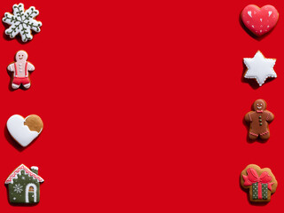 Red Christmas advertising background. Cookie frame. Winter holidays ornament. Different homemade gingerbread biscuit festive composition isolated on bright copy space.