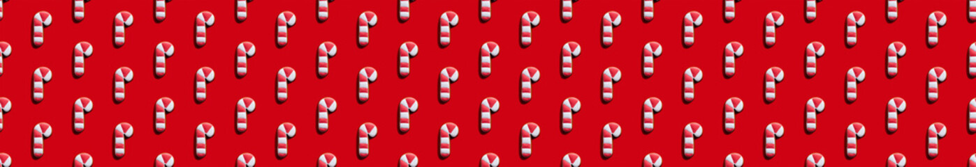 Xmas lollipop pattern. Red seamless background. Noel symbol. Festive decorative composition. White striped peppermint candy cane abstract arrangement isolated on bright.