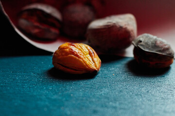 roasted chestnuts in a paper